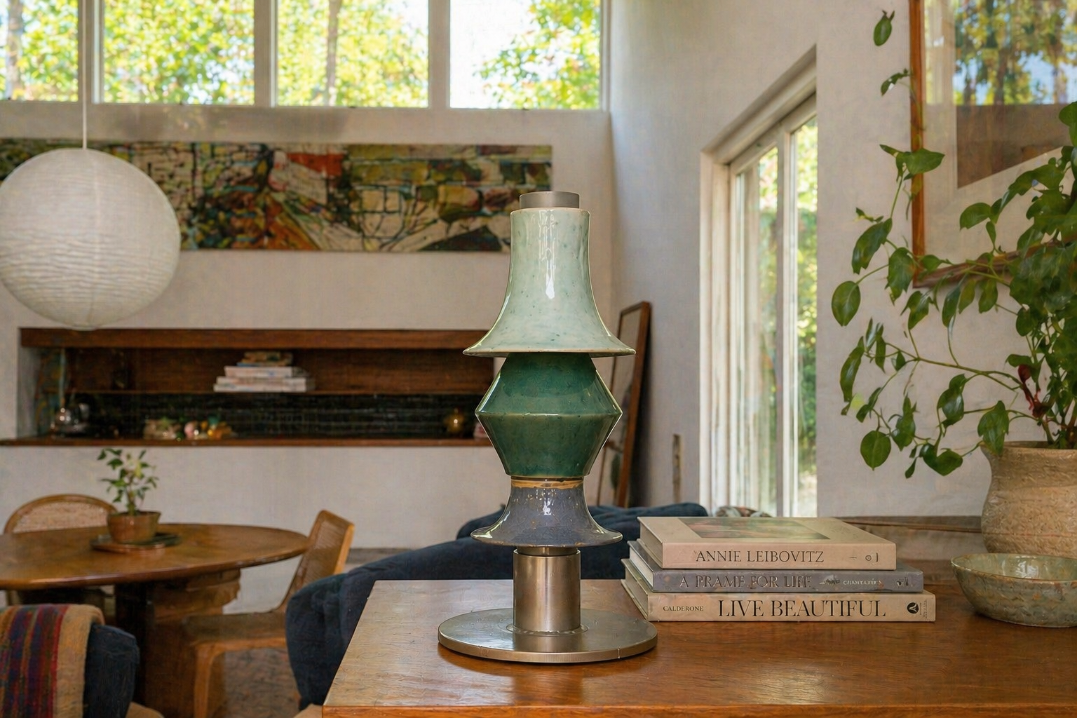 thi table lamp on a wooden table in a bright airy room with paper lantern